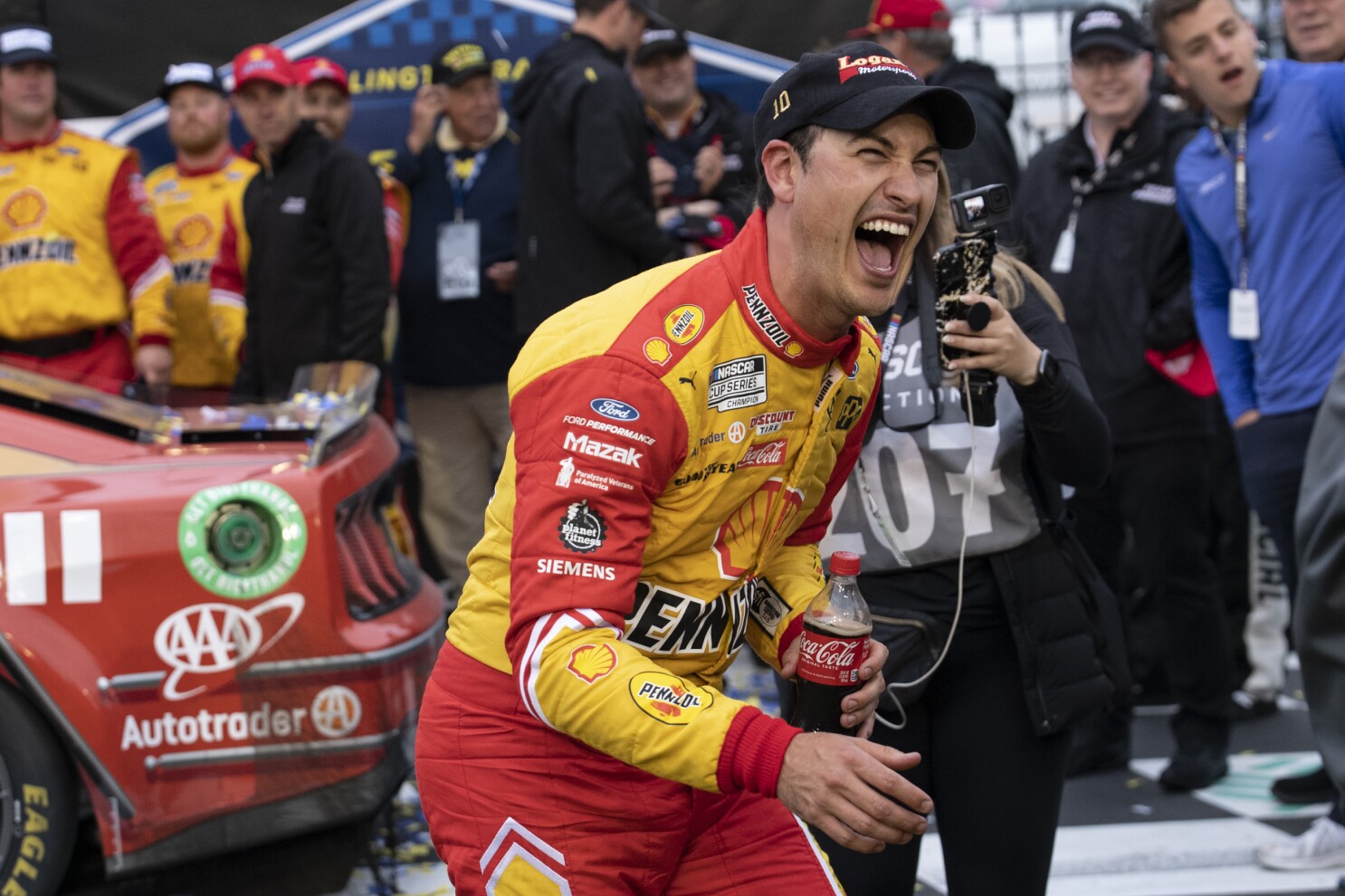 Logano defeats Byron to earn the Cup pole at Charlotte Race